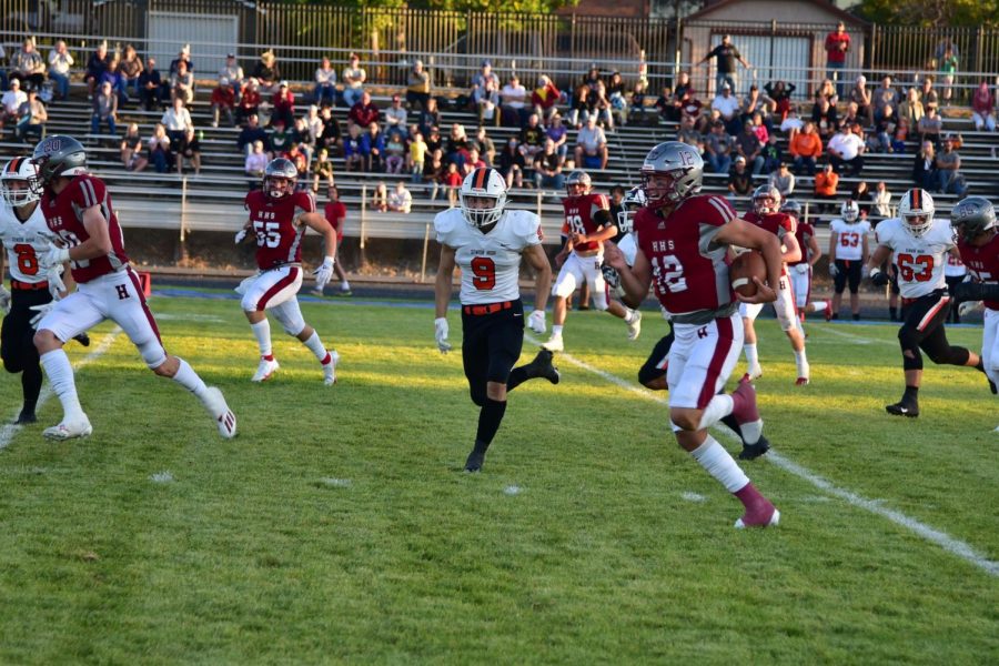 Kaden Huot (12) makes a run down the field. 