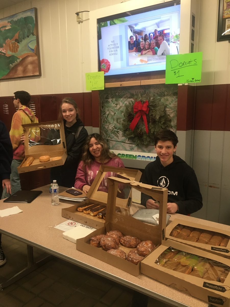 Green Group club members selling doughnuts in 2021 to fund environmental activities and causes (photo by Ms. Van Alstyne)