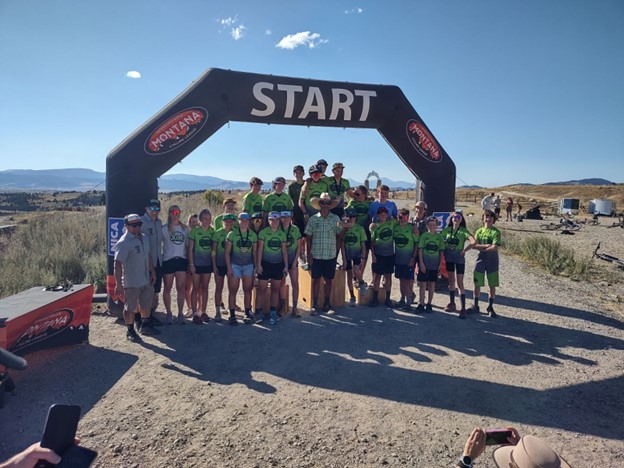  Helena Cyclones team picture after team results during the Copper Kings Clash race with coach Troy in the center